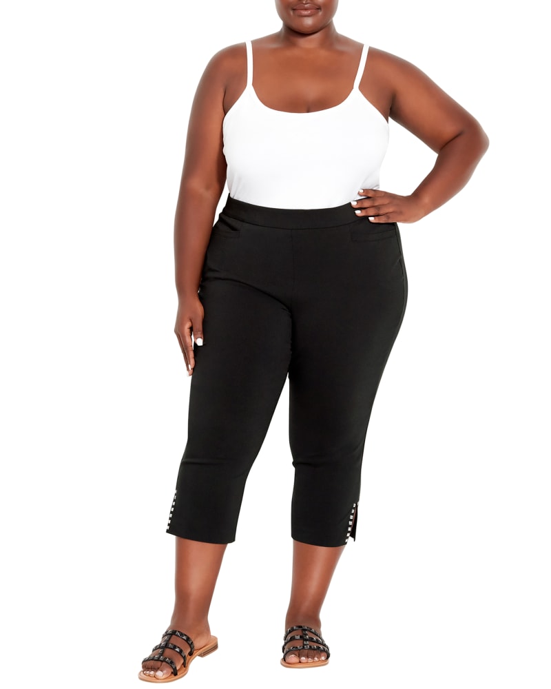 Front of a model wearing a size 26 Nikki Stretch Capri in Black by avenue. | dia_product_style_image_id:293567